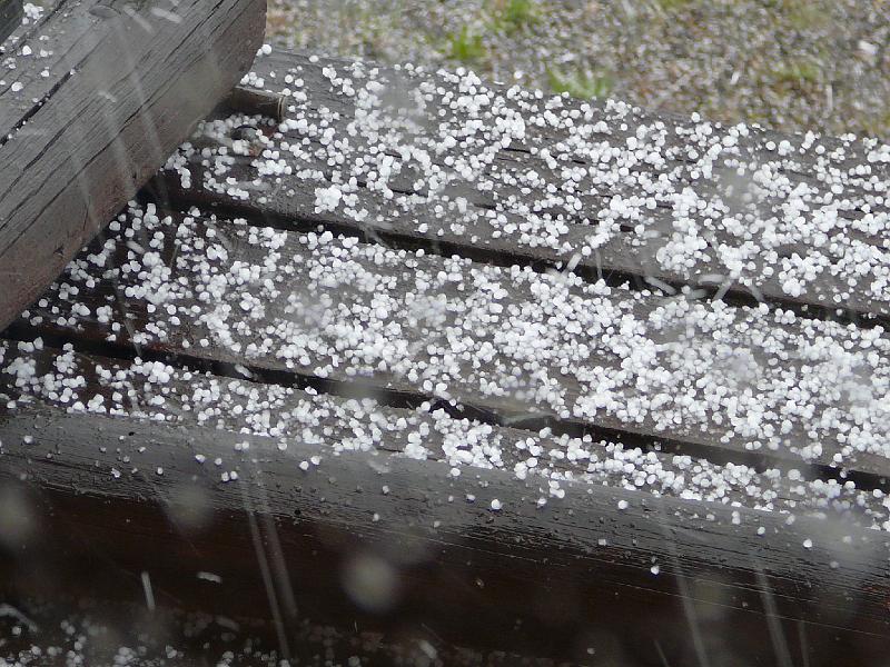 Hail on porch 2.jpg - It hailed our first day at Tish's cabin.
